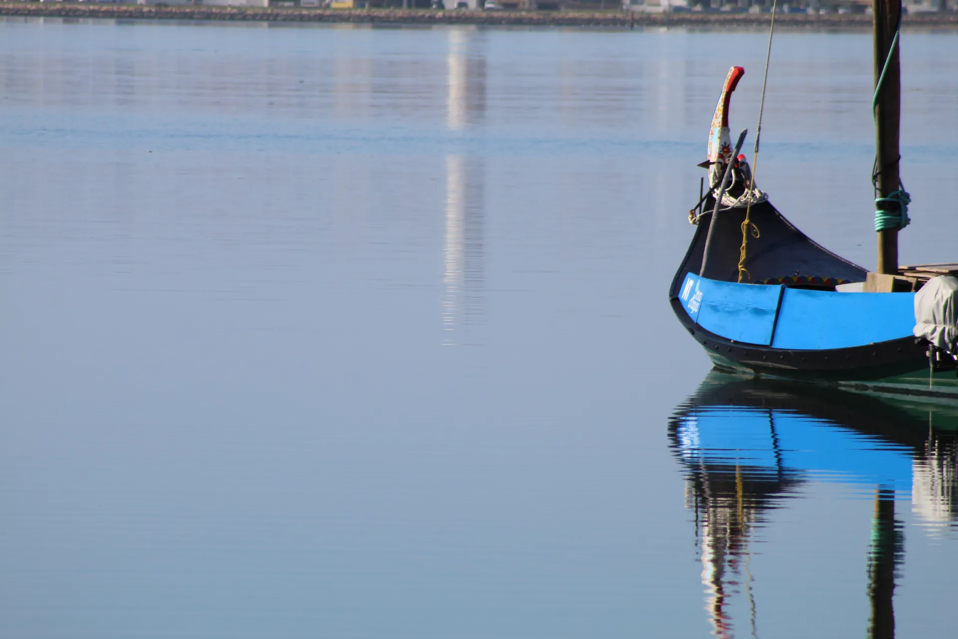 Calm boat journey through the waterways of the Ria de Aveiro at golden hour