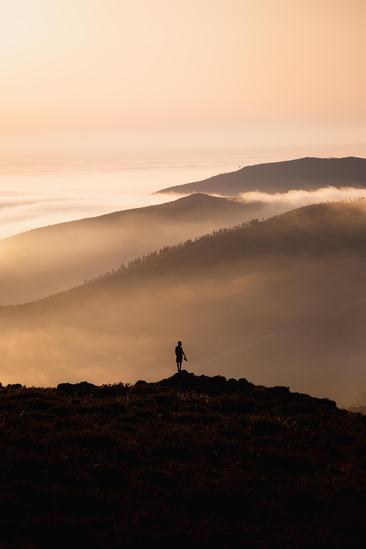 Morning mist rolling through mountain valleys in northern Portugal